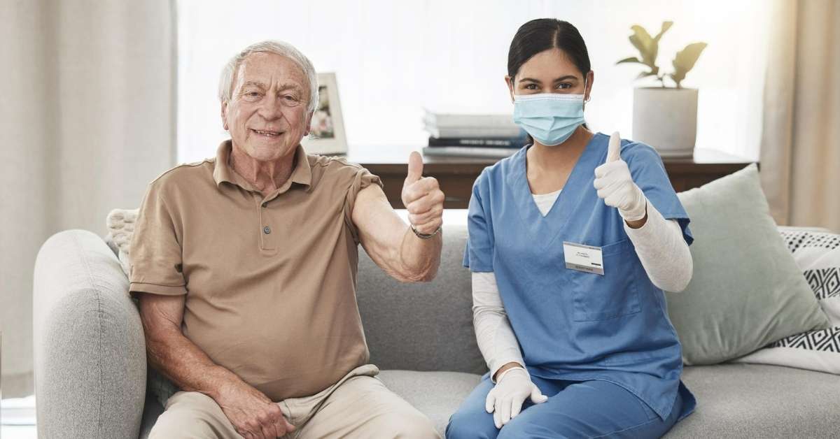 Home care vs nursing home comparison showing a senior and professional caregiver together at home in Pennsylvania.