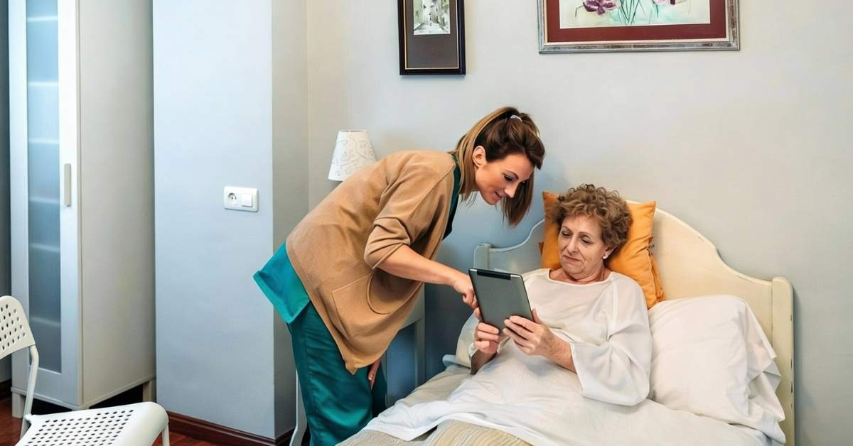 Caregiver assisting a senior patient at home after hospital discharge, providing post-hospital discharge care and recovery support.